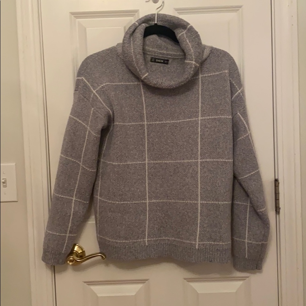 Grey sweater with white stripes